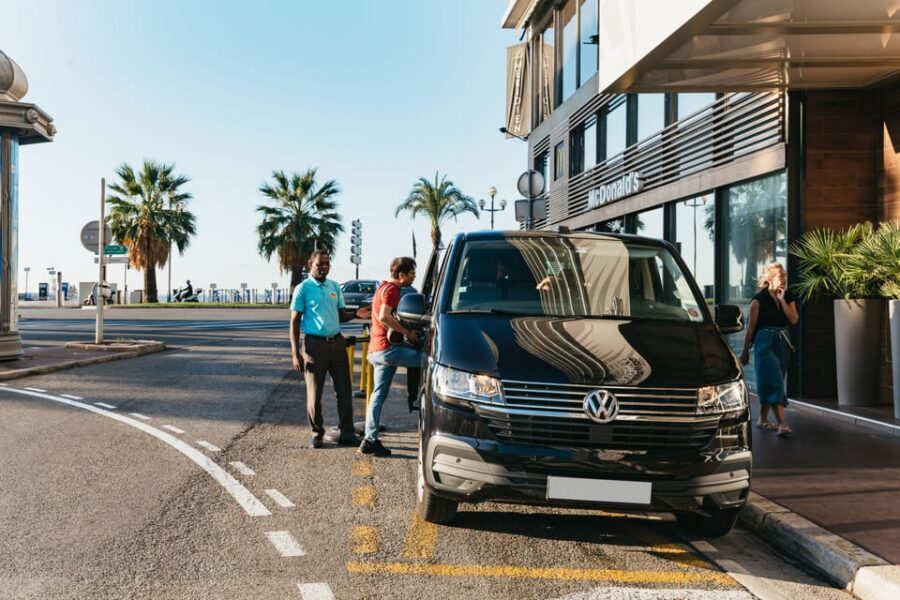 From Nice: Eze, Monaco, & Monte-Carlo Half-Day Trip - Rolling onto the Monaco Grand Prix circuit toward Monte Carlo