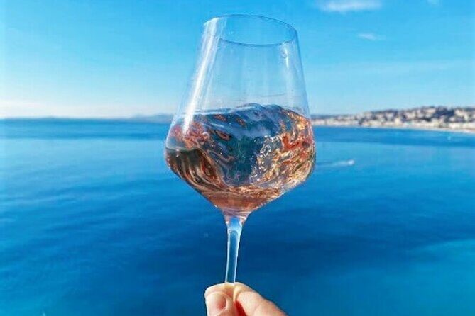 Nice Walking Tour with Wine Tasting - Promenade des Anglais: palm silhouettes and the English winter tradition